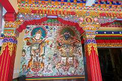 Wall paintings at the entrance to the main assembly hall of the Upper Gompa, Gontse Gaden Rabgyel Ling (GRL) Monastery.