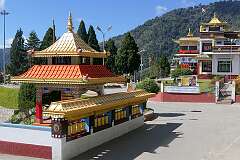 The Upper Gompa, Gontse Gaden Rabgyel Ling (GRL) Monastery seen from the pavilion with its large prayer wheel.