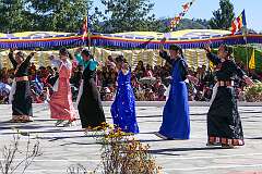 Students from Bomdila perform a group dance.