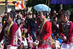 Young women perform a group dance.