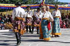 Students perform a Tibetan group dance, depicting agriculture.
