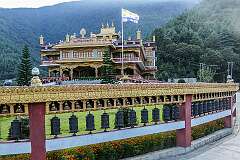 The Thupsung Dhargye Ling Monastery, with its wall of prayer wheels, Dirang.
