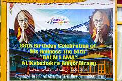 Poster announcing the 88th birthday of the 14th Dalai Lama at he Kalachakra Gompa in Dirang; he inaugurated it on 17 April 1983.