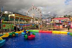 The fairground with children's rides, on the Parade Ground of Tawang
