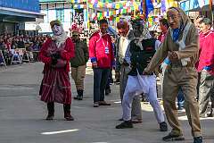 Masked dancers, in the Carnival Parade on the first day of the Tawang Festival.