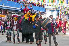 Dancing “yaks” with masked dancer in the Carnival Parade on the first day of the Tawang Festival.