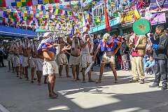 “Skeleton” dancers, with drum, in the Carnival Parade on the first day of the Tawang Festival.