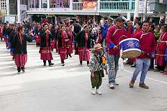 The Carnival Parade, with many colourful dancers, on the last day of the Tawang Festival.