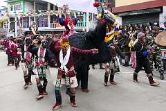 The Carnival Parade, with many colourful dancers, on the last day of the Tawang Festival.
