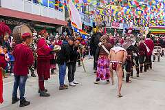 The Carnival Parade, with many colourful dancers, on the last day of the Tawang Festival.