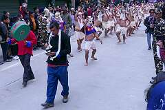 The Carnival Parade, with many colourful dancers, on the last day of the Tawang Festival.