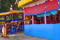 Monks providing accompaniment during a spiritual dance at the Drub-chod-Chen-Mo Torgya, at the (GRL) Monastery in Bomdila, with two “dungchen”, a long horn, cymbals and drums.