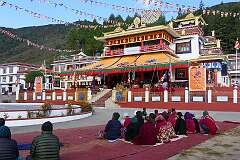 People waiting for the second day of the Torgya festival at the monastery.