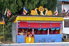 Monks providing accompaniment during a spiritual dance at the Torgya, with two “dungchen”, a long horn, cymbals and drums.