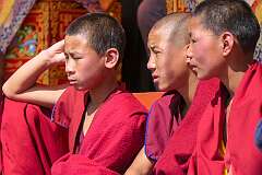 Young novice monks watching the spiritual dances.