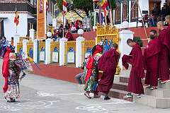 Participants in the spiritual dance at the Drub-chod-Chen-Mo temple festival return to the main hall of the Gontse Gaden Rabgyel Ling (GRL) Monastery in Bomdila, each accompanied by a monk.