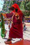 A “clown”, played by a masked monk, on the terrace of the monastery, for light relief during the temple ceremony.