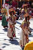 Dancers with elaborate headdresses perform a spiritual dance