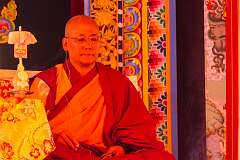 Geshe Dondup Tsering, the Abbot of the Gontse Gaden Rabgyel Ling Monastery, at the entrance of the main hall during the Torgya ceremony.