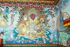 Wall painting at the entrance to the main assembly hall of the Khinmey Nyingma Monastery.