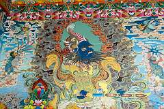 Wall painting at the entrance to the main assembly hall of the Khinmey Nyingma Monastery.