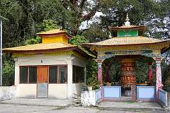 A hall and large prayer wheel, Urgelling Monastery, the birthplace of 6th Dalai Lama, just southeast of Tawang.