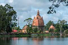 Siva Dol, Vishnu Dol, and Devi Dol, temples built by Bar Raja Ambika, queen of the Ahom king Swargadeo Siva Singha (1714–1744) along the Sivasagar tank.