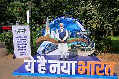 Propaganda poster “Make in India” with a life-size cardboard cutout of the Prime Minister, Narendra Modi, in the Panjim Municipal Garden.