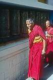 Tibetan nuns at the prayer wheels in the Tsuglagkhang temple.