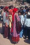 Western hippies, watching the Tibetan Opera during the festivities celebrating 19 years of the Tibetan Children's Village in McLeod Ganj, Dharamshala.