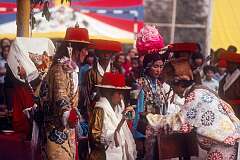 A scene in the Lhamo (Tibetan Opera) performance depicting offering a “khatag” ceremonial shawl to a boy.