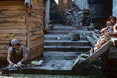 Doing the laundry along a canal.