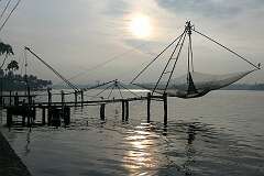 A Chinese fishing net - called Cheenavala in Malayalam - a type of stationary lift net on Ashtamudi Lake, Mathilil.
