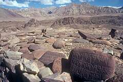 Mani stone, carved with the six syllabled mantra of Avalokiteshvara, Om mani padme hum, as a form of prayer in Tibetan Buddhism, near Alchi Gompa.