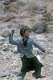 A boy with a slingshot, along the road to Hemis Gompa.