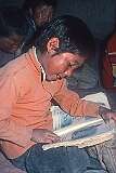 A boy reading English, in Lamdon Model School, a private English-language school in Leh.