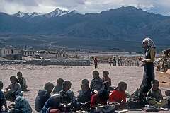 A school class outside at the SOS Tibetan Children's Village that cares for refugee children. In the background the Indus River.