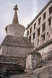 A chorten (pagoda) in front of Thikse Gompa, a large hilltop monastery, affiliated with the Gelug (Yellow Hat) school of Tibetan Buddhism.