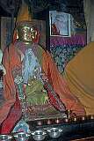 A gilded Buddha statue, with a portrait of the Dalai Lama, Thikse Gompa.