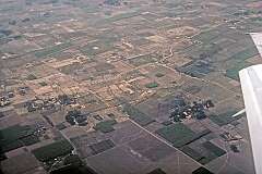 Flying over the farms east of Khajuraho.