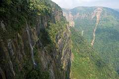 View to the waterfalls from the viewpoint along the trail to Arwah Cave.