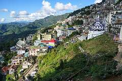 View of the steep city of Aizawl from the Central Road, Chanmari West, Aizawl.