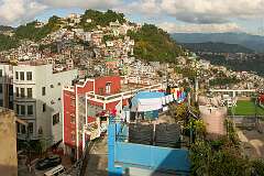 View from the roof of the Mizoram State Museum on MacDonald Hill, one of the many churches and the large cross on the hill.