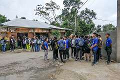 School students in front of the Green Hills restaurant and home stay in Reiek,