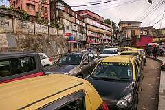 Local taxis on the Kohima-Mokokchung Road, Naga Bazaar, Kohima.