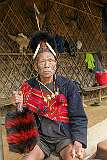 Penlung, an elderly Konyak Naga man in traditional attire at Tonyei Ahng's house in Sheanghah Chingnyu.