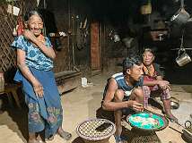 Tonyei Ahng, with Ngonphe and Lihkhao, at their home and Home Stay in the Konyak Naga village of Sheanghah Chingnyu.