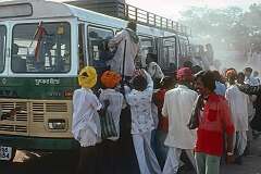 People tried to board a bus from Ajmer to Pushkar.