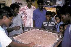 Young men and boys playing a game.