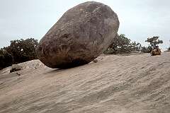 A balancing rock, known locally as “Krishna's Butter Ball”, in Mamallapuram, just north of Arjuna's Penance.